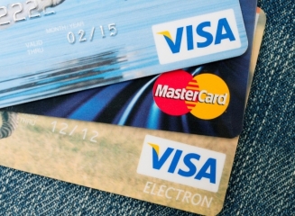 Visa si MasterCard vor plati retailerilor $5,7 miliarde în urma unui litigiu privind comisioane incorecte